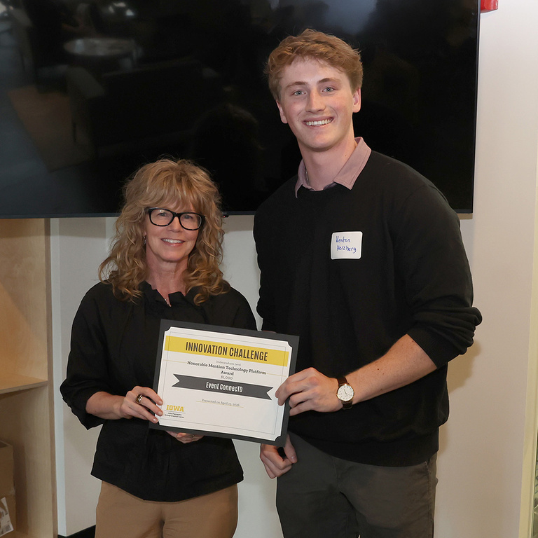 Dana Rupe, director of Iowa JPEC, and Keaton Herzberg of Event ConnecTD