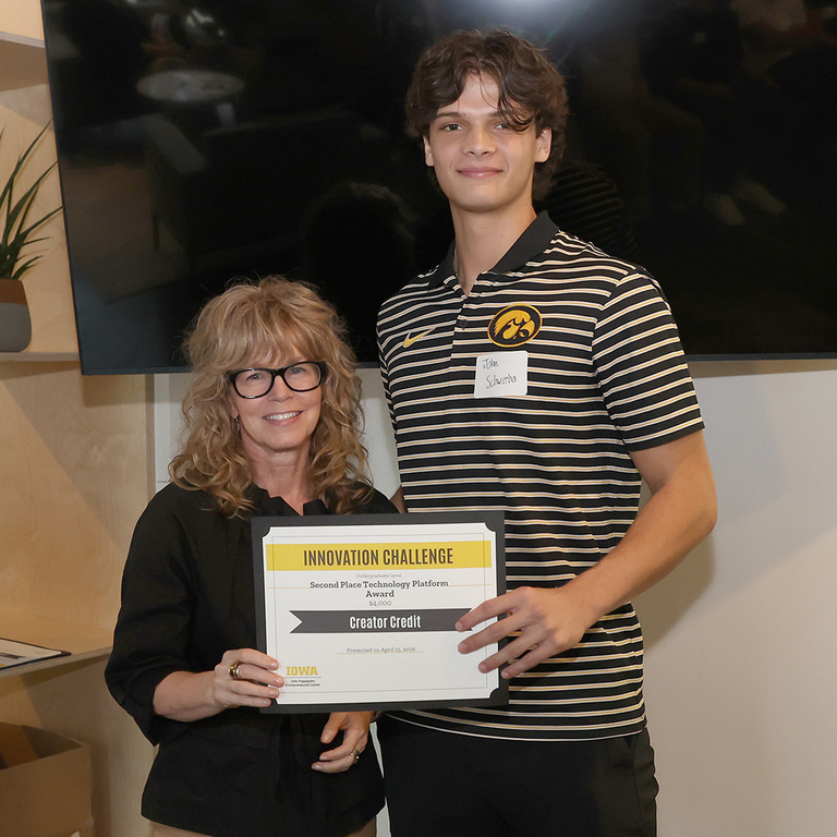 Dana Rupe, director of Iowa JPEC, and John Schwerha of Creator Credit