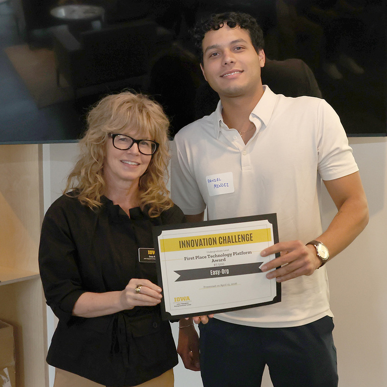Dana Rupe, director of Iowa JPEC, and Daniel Mendez of Easy-Org