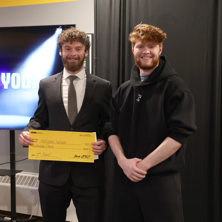 2nd Place Lifestyle/Tech: Malcolm Wilson with judge Tyler Graham.